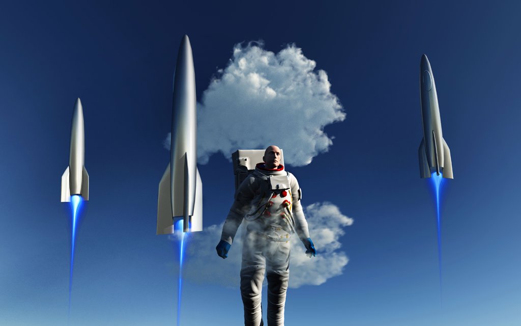 MALE HUMAN ASTRONAUT AND ROCKETS BLASTING OFF