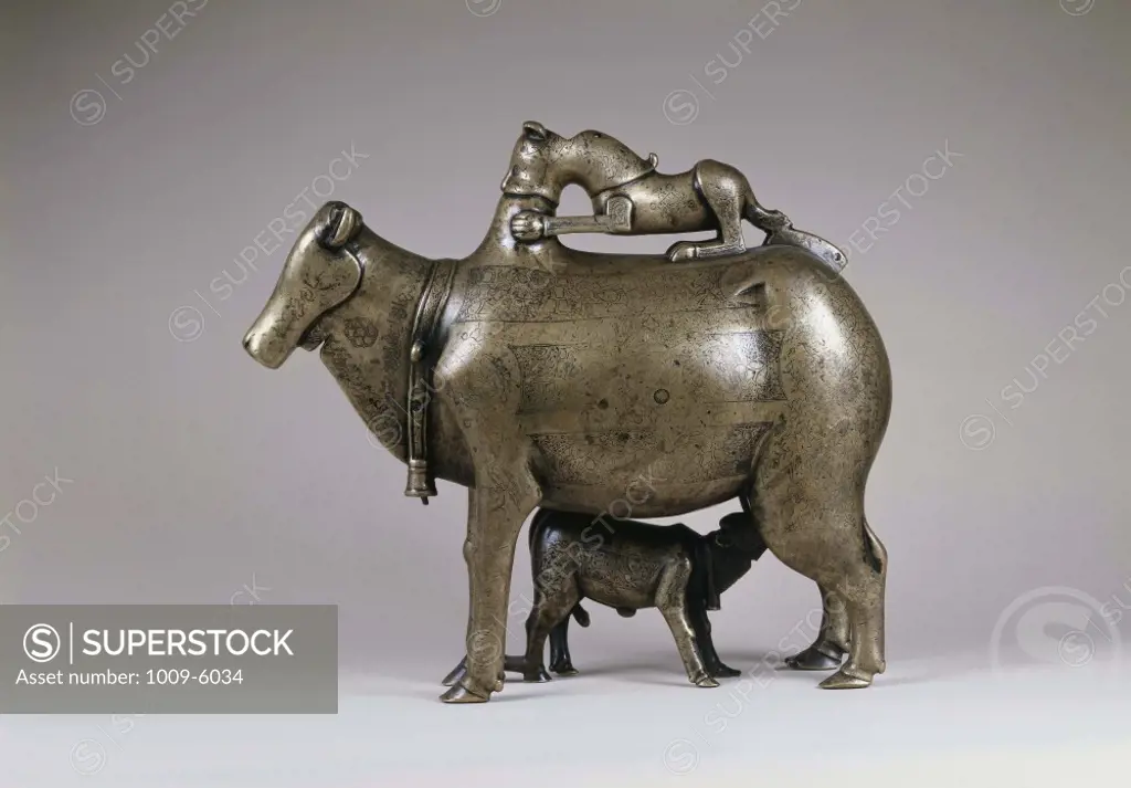 Cow and Heifers Water Pitcher  c. 1206 Master Ali Ibu Muhammed (12th -13th C)   Bronze Cast Inlaid with Silver Hermitage Museum, St. Petersburg  