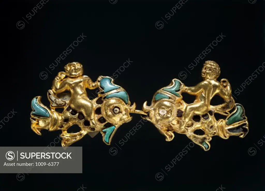 Bactrian Gold: Clasps of Cupids Riding Dolphins Artist Unknown Kabul Museum, Afghanistan 
