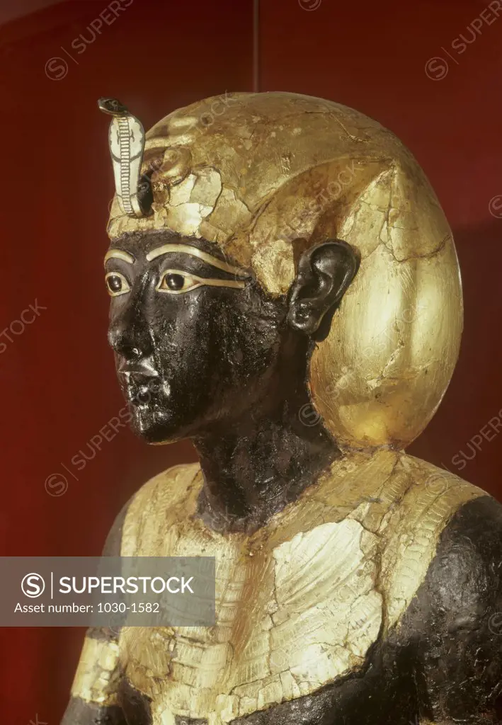 Statue of Ka of Tutankhamen.  Detail:  Bust  c. 1347-1337 B.C.,   Artist Unknown Egyptian  Wood, Bronze, Gold, Glass Egyptian Museum, Cairo 
