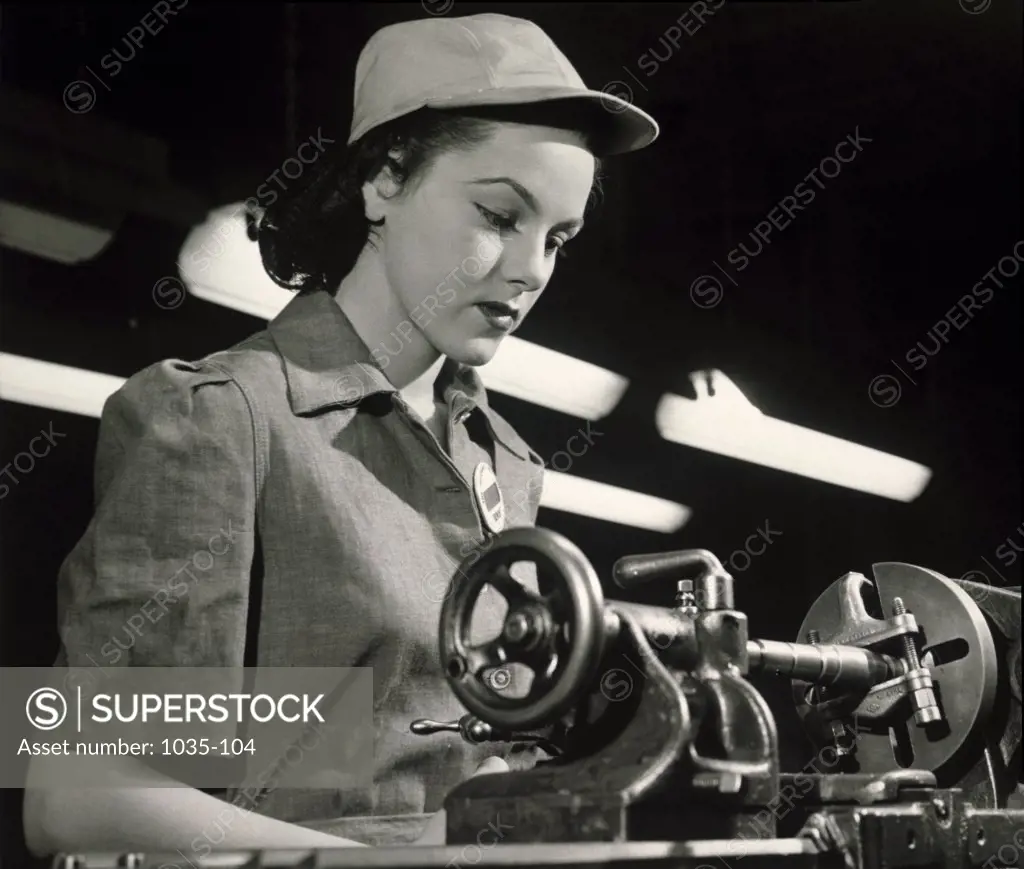 Young woman working in a factory