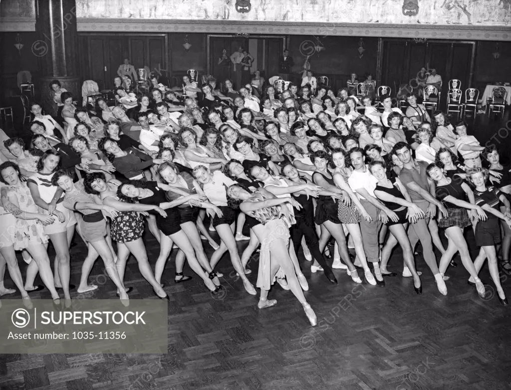 Chicago, Illinois: August, 1950. Members of the National Association of Dance and Affiliated Artists at the University of the Arts pose for a laid back group portrait as they celebrate their first year of existence.©Underwood Archives