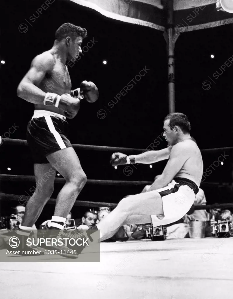 New York, New York:  June 20, 1960. Ingemar Johansson is out for the count in the 5th round in his heavywieght champioship bout with Floyd Patterson at the Polo Grounds.