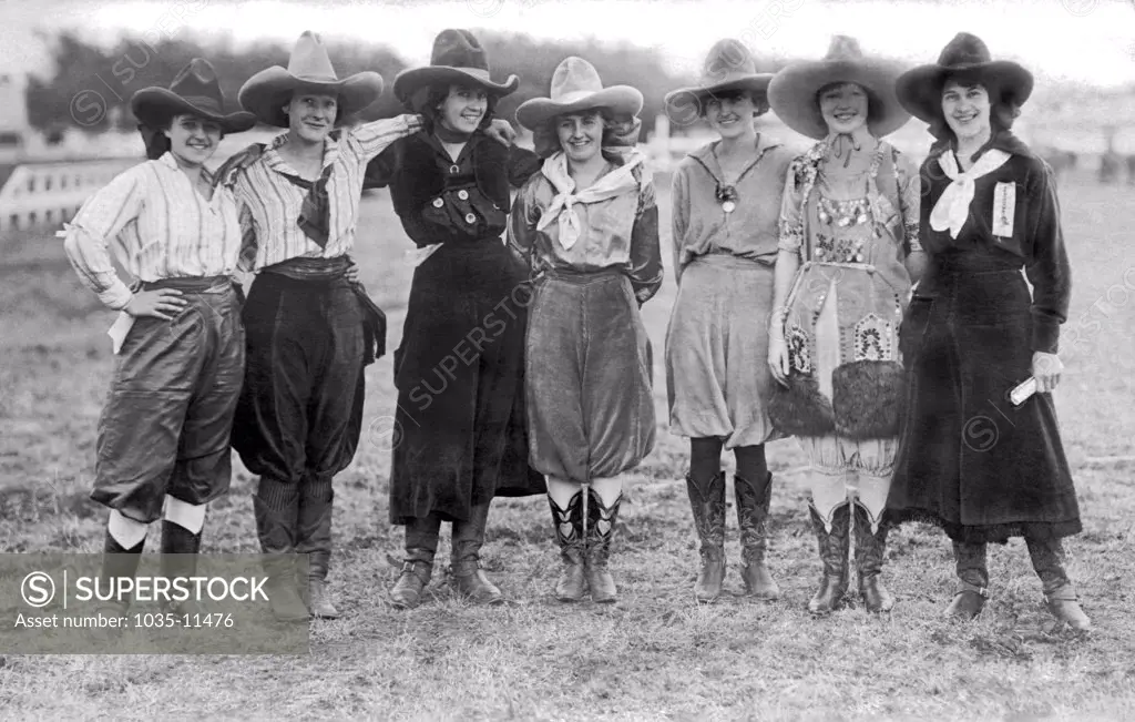 Cheyenne, Wyoming:  c. 1908. Cowgirls at the roundup and rodeo. L-R: Rene Hafley, Fox Hastings, Rose Smith, Ruth Roach,  Mable Strickland, Prairie Rose Henderson, Dorothy Morell