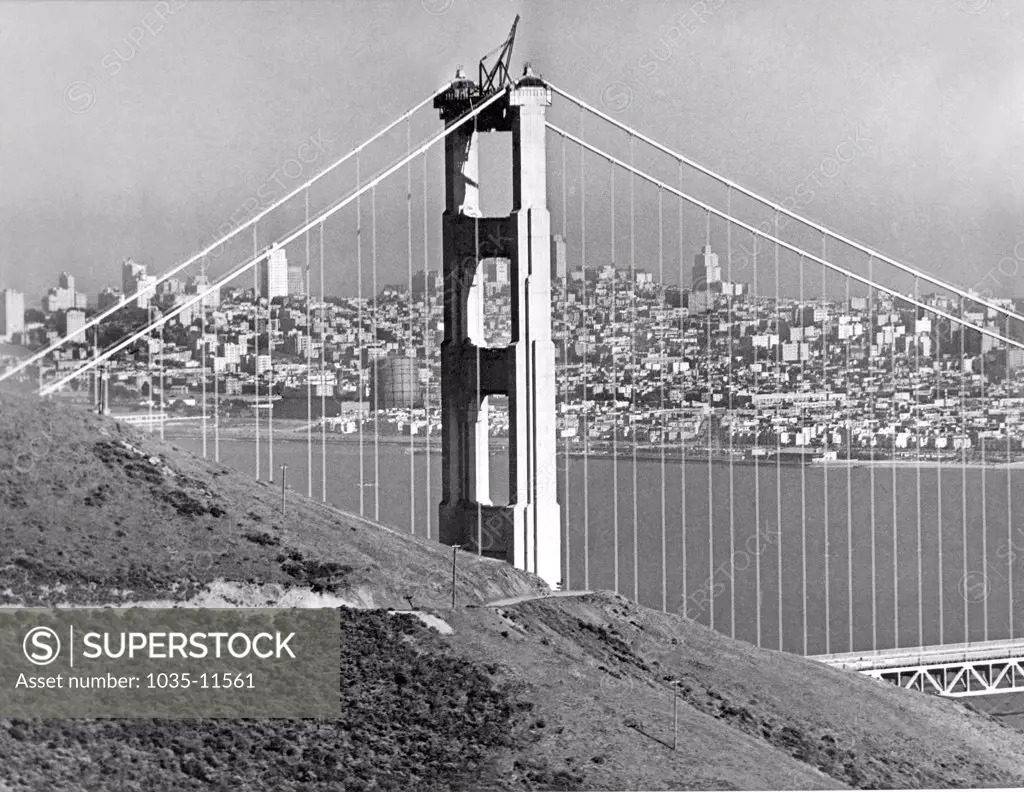 San Francisco, California:  April 26,1937. One more month and the Golden Gate Bridge will be open. Here is the view from the Marin Headlands with the city in the background.