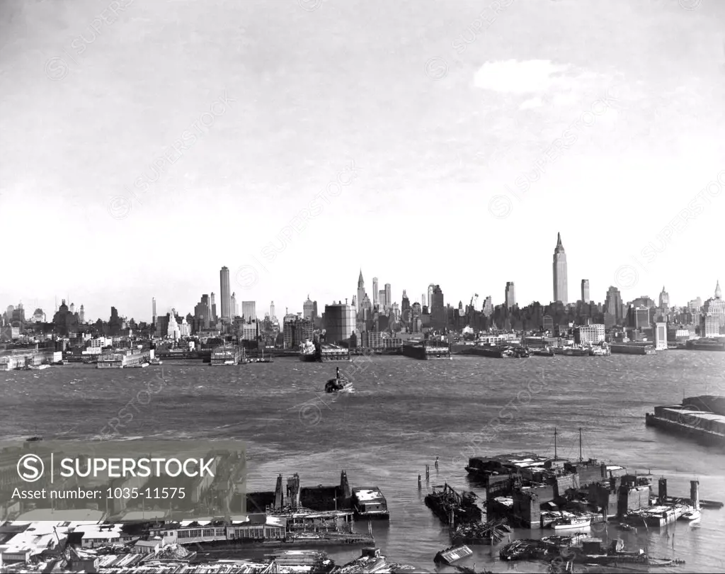 New York, New York:  c. 1934. The skyline of midtown Manhattan as seen across the Hudson River from New Jersey.