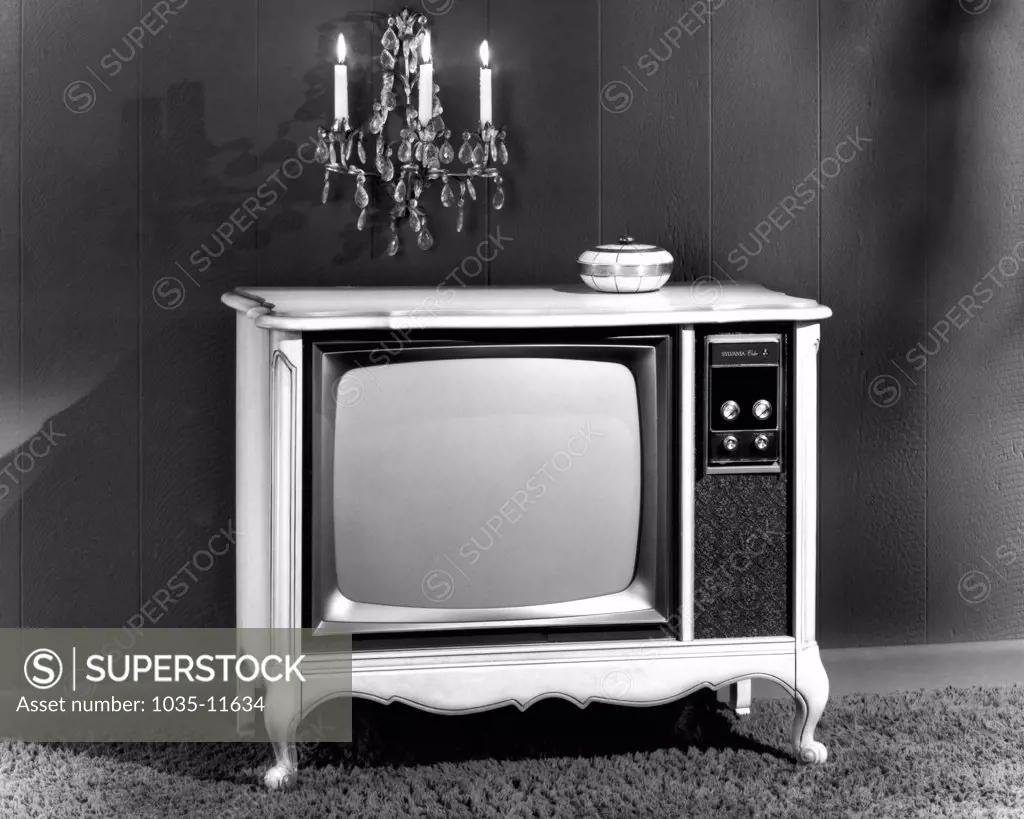 New York, New York:  May 27, 1969. Sylvania Electric Products introduces its 1970 color television line with Instant Color pictures and new chairside remote pushbutton tuning. Featured here is the French Provincial style console.