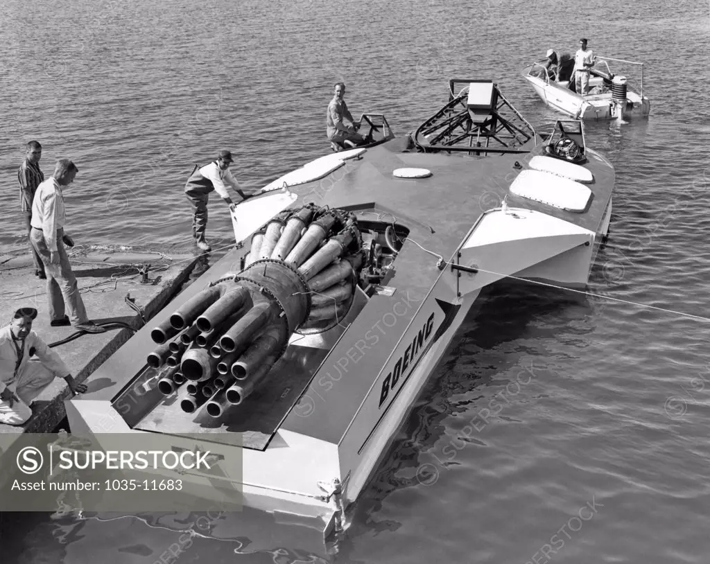 Seattle, Washington:  c. 1961. The Aqua-Jet on Lake Washington, a jet engine powered experimental speed boat made by Boeing. It is 38 feet long with a 17 foot beam, can reach speeds of 100 knots (115 mph), and is powered by an Allison J-3 turbojet with 4600 pounds of thrust.