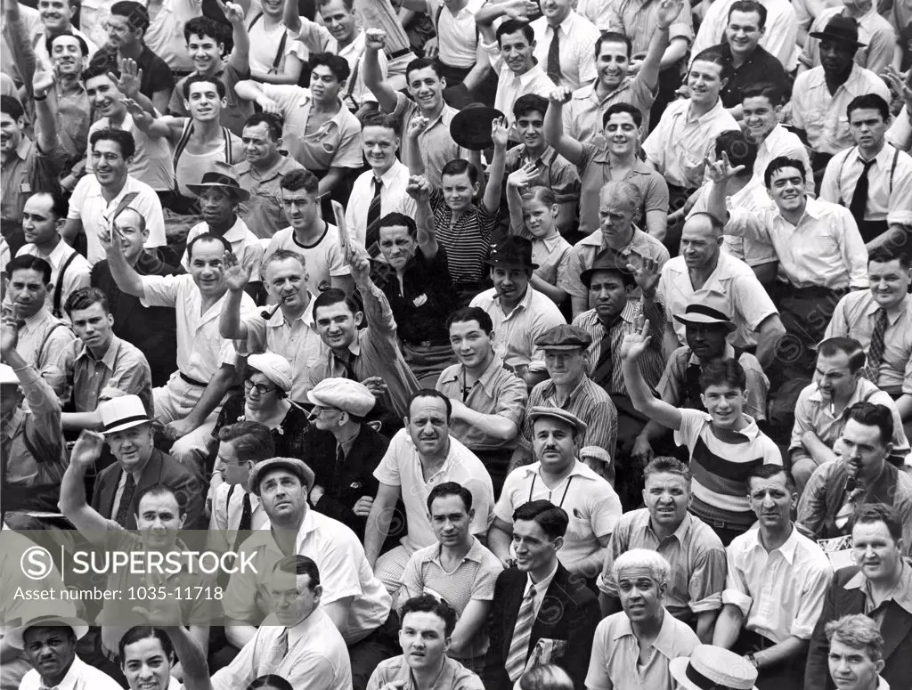 New York, New York:  c. 1938. Happy baseball fans in the bleachers at Yankee Stadium.
