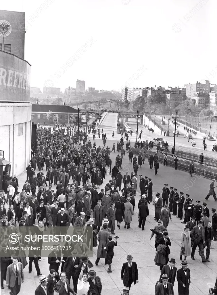 New York, New York:  c. 1938. Fans leaving Yankee Stadium after a game.