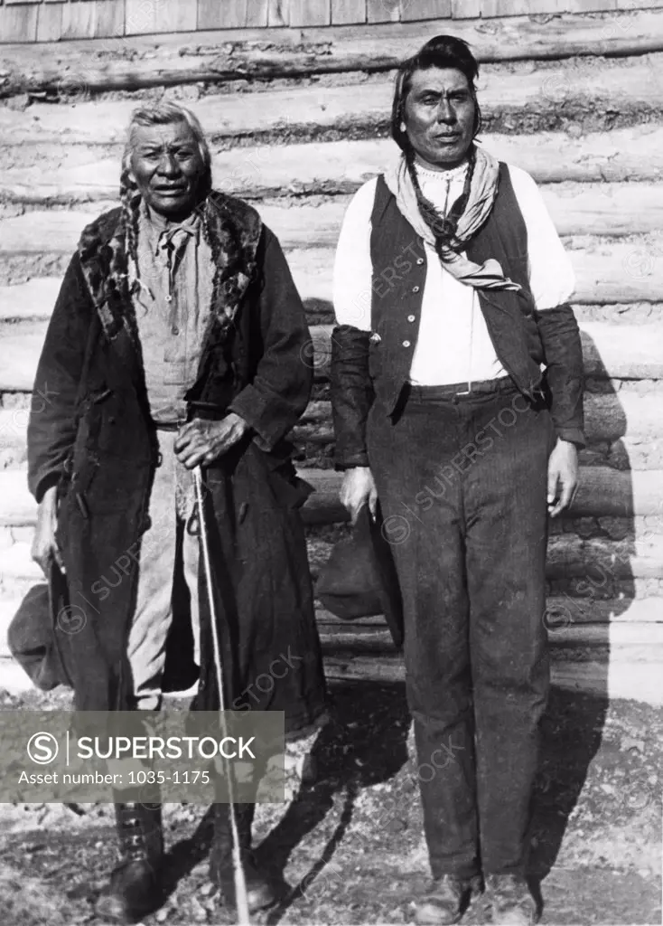 Native American man standing with his son, Montana, USA