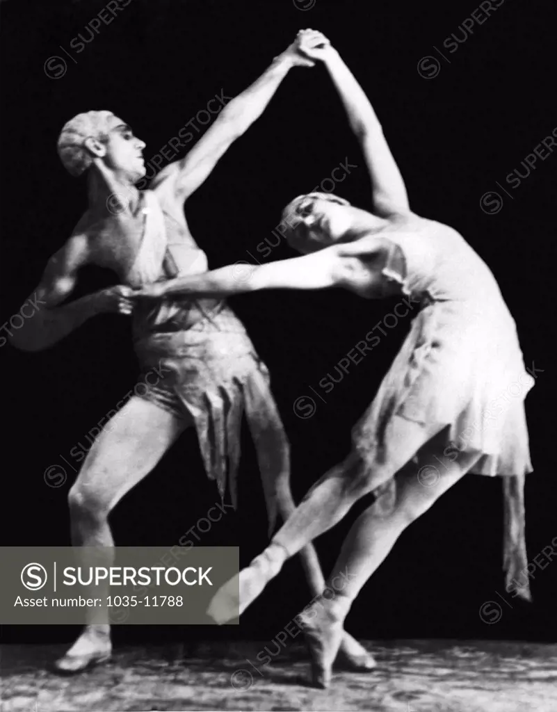 Moscow, Russia:  April 27, 1936. Asaf and Sulamith Messerer of the Moscow Opera Ballet will make their American debut next winter in New York City with dances from 'Salambo', 'The Red Poppy', 'Don Quixote', 'Flame of Paris', and other new Soviet ballets. This pose is from the 'Flame of Paris'.