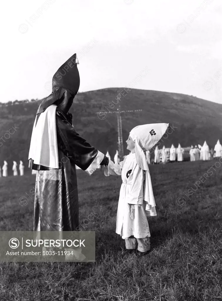 Stone Mountain, Georgia:   July 23, 1948. Klan tykes appear in regalia at the mass initiations into the Ku Klux Klan.