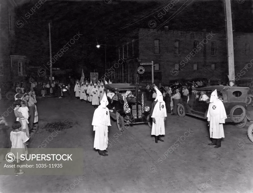 Muncie, Indiana:  1923. A Ku Klux Klan nighttime parade in Indiana.