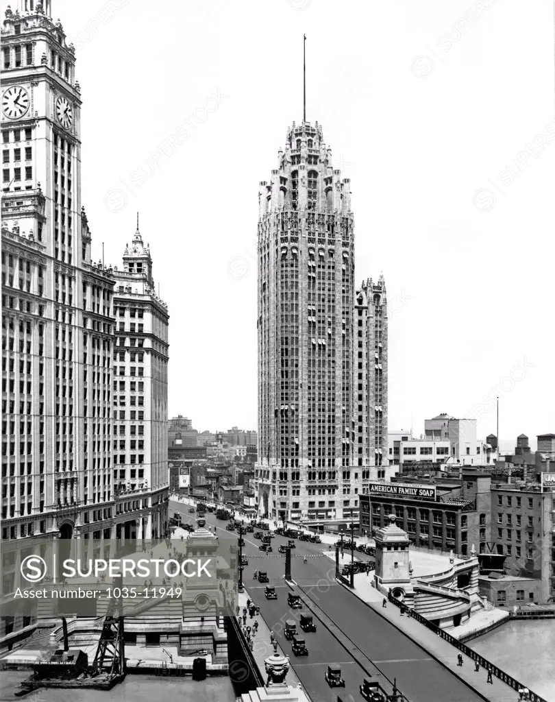 Chicago, Illinois:  1925. The Michigan Avenue Bridge and the the Wrigley  (left) and Tribune (center) Buildings in Chicago, Illinois.