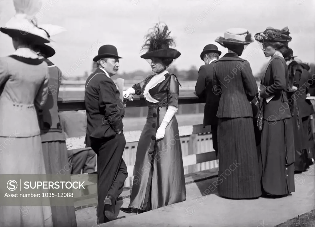 Benning, Maryland: 1912. August Belmont Jr. and Mrs. Donald Cameron at the Benning Race Track in Maryland.