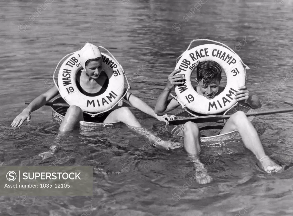 Miami, Florida:  1931. The respective boy and girl winners of the 1931 Miami Washtub Races.