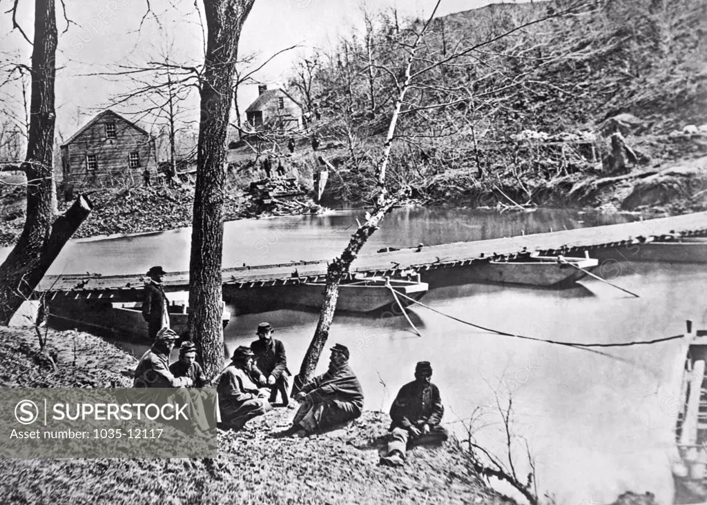 Bull Run, Virginia:  c. 1863. Troops gathered by the pontoon bridge at the Ford at Bull Run.