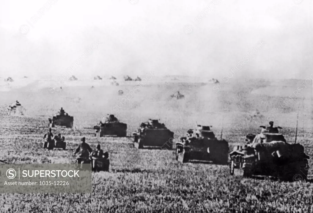 Stalingrad, Russia:   1942. Columns of Nazi tanks advance across the barren plains towards Stalingrad in Russia. The photograph is from a captured Nazi newsreel.