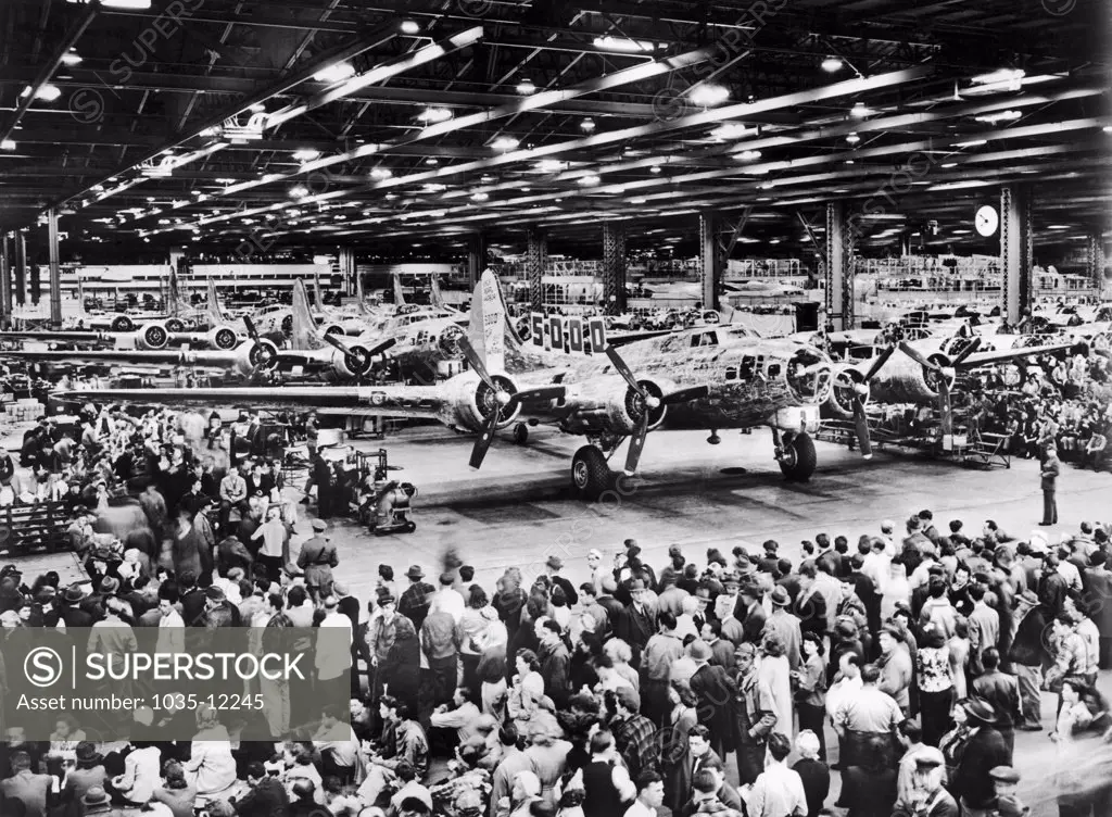 Seattle, Washington:  May, 1944. The workers celebrate the 5,000th Boeing B-17 built since Pearl Harbor at Plant #2 in Seattle.