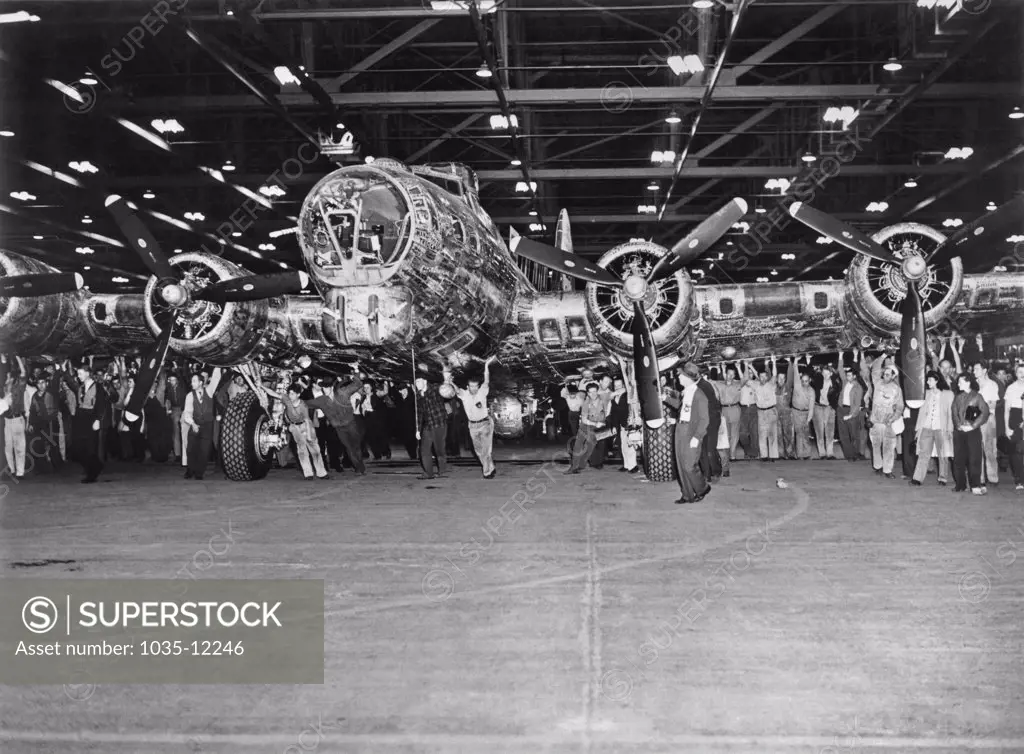 Seattle, Washington:  May, 1944. The workers at Plant #2 in Seattle with the 5,000th Boeing B-17 built since Pearl Harbor.