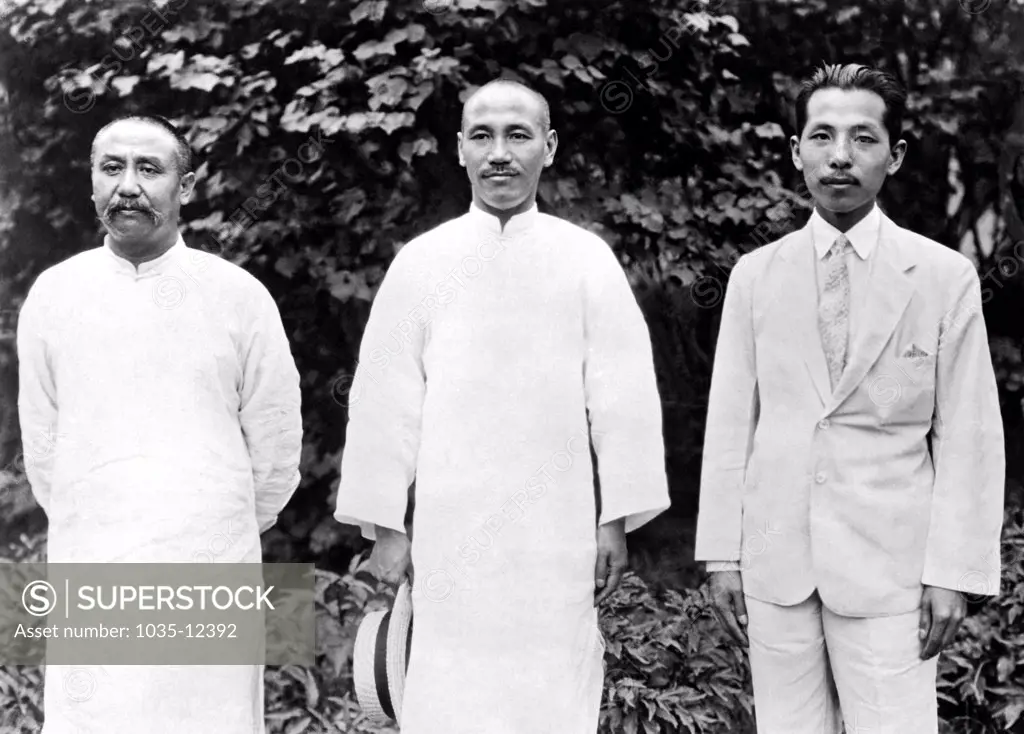 Peking, China:   c. 1928 China's war leaders are in conference during the latest Chinese-Russian crisis. L-R are: General Yen Hsi-shan, Shansi commander; General Chiang Kai-Shek, President of the Nationalist Government of China; and General Chang Hsiao-liang, war lord of Manchuria.