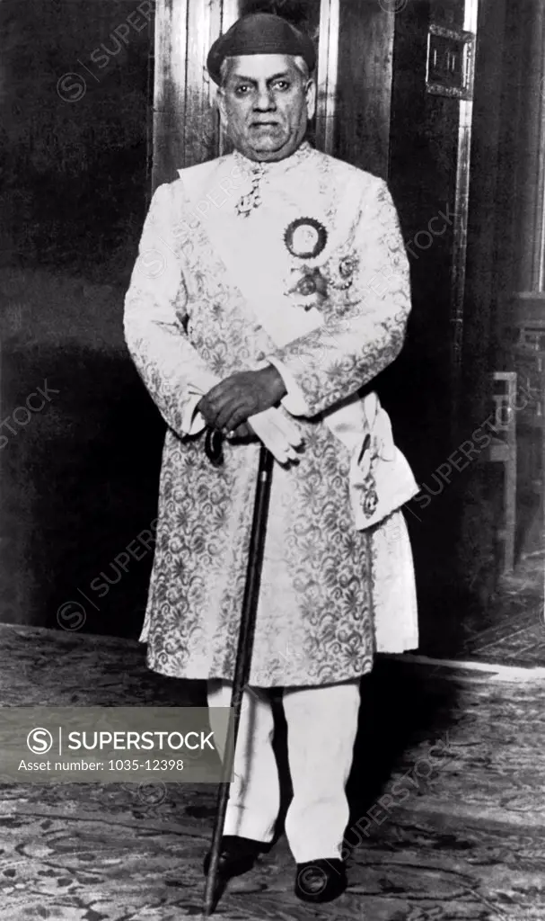 London, England:  c. 1926. The Maharajah Gaekwar of Baroda, India at the Round Table Conference dinner party given by King George.