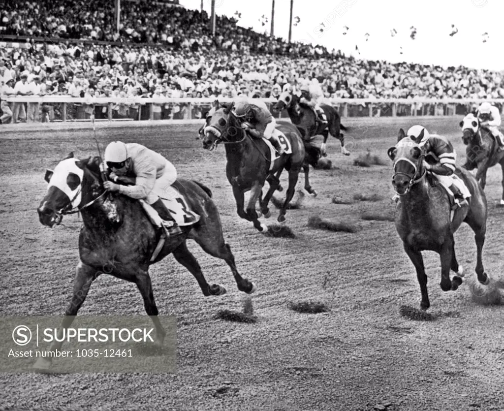 Miami, Florida:  January 6, 1962. South Star, No.3, with jockey Ovidio Diaz wins the first race at Tropical Park.