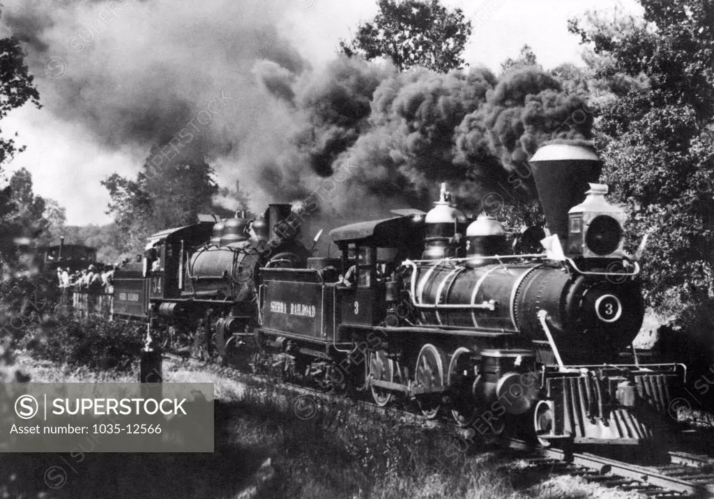 California:  c. 1900. The Sierra Railroad steaming through the foothills up into the Sierra Mountains.