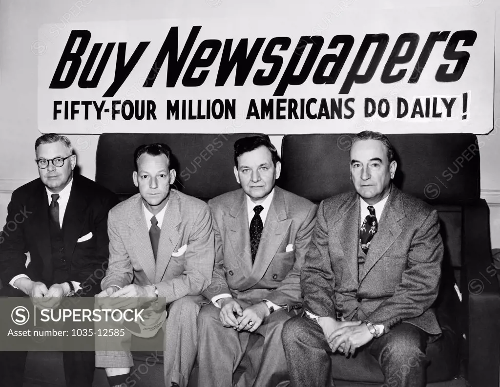 Ft. Worth, Texas:  1953 Executives of the Trinity News Company in Ft. Worth promote their business..