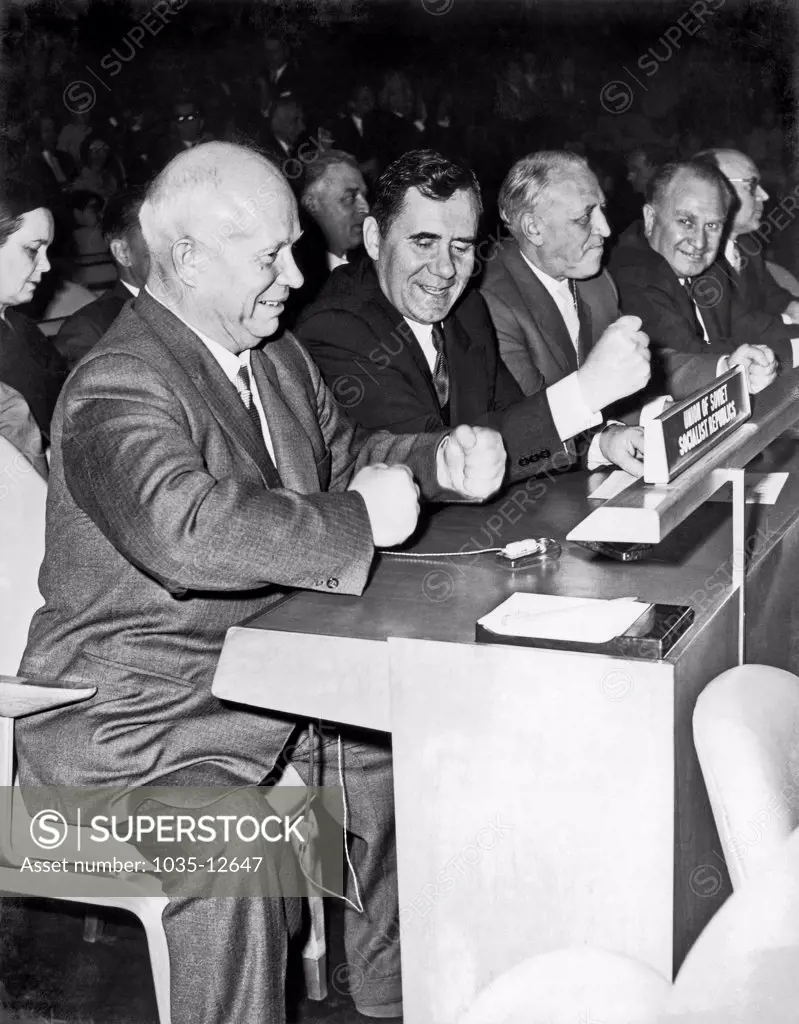 New York, New York:  1960. Nikita Khrushchev makes a point by pounding his fists on the table at the United Nations. Andrei Gromyko is practicing at his left.