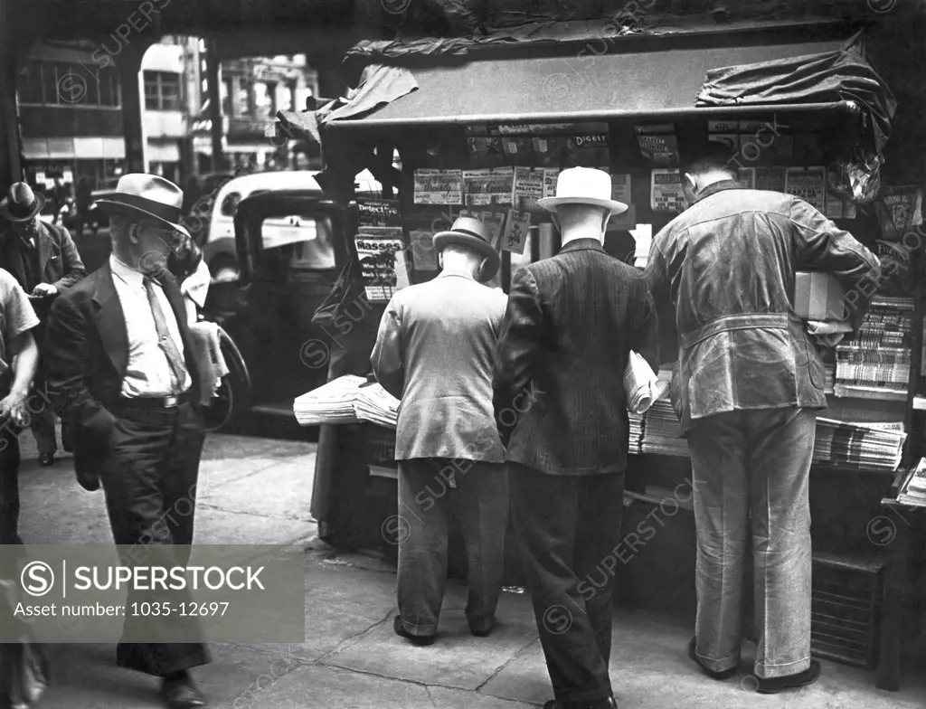 New York, New York:    c. 1938 A newspaper stand at 3rd Avenue and 42nd Street.