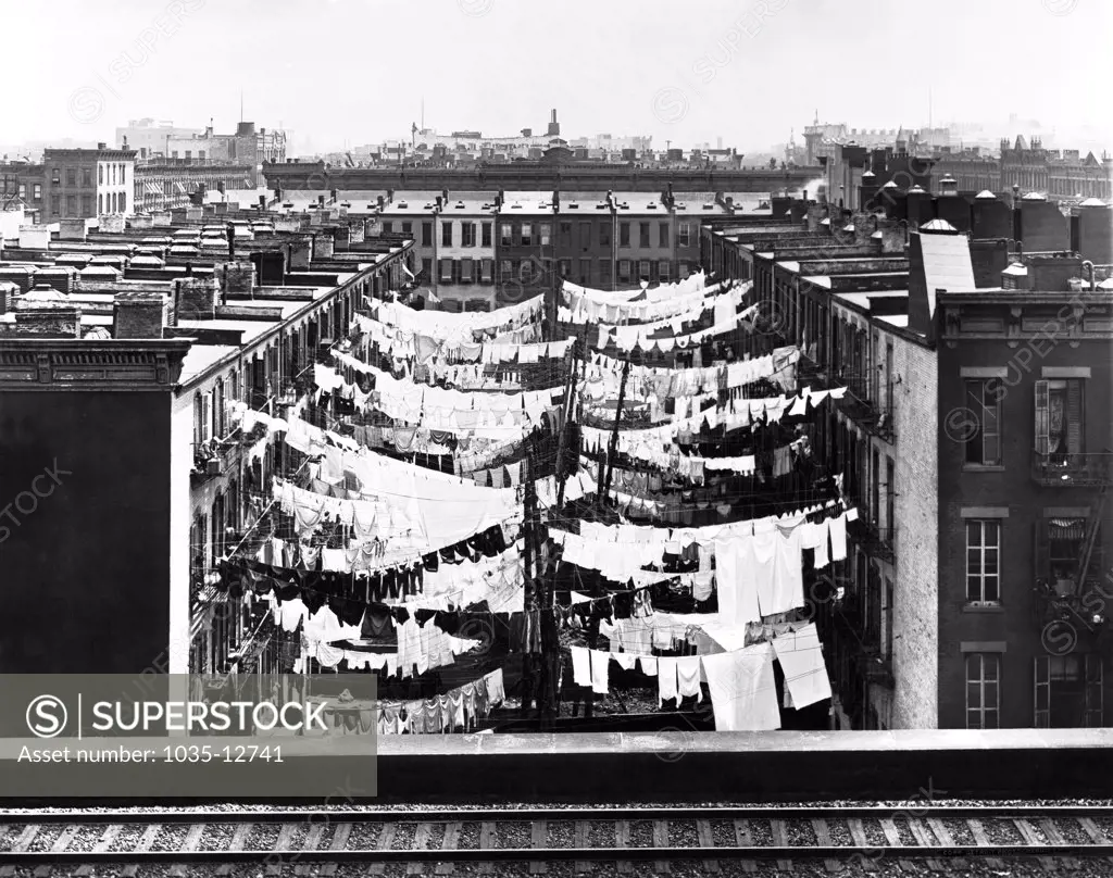 New York, New York:  c.  1900 Laundry hanging in the back of tenement housing at Park Ave and 107th St.