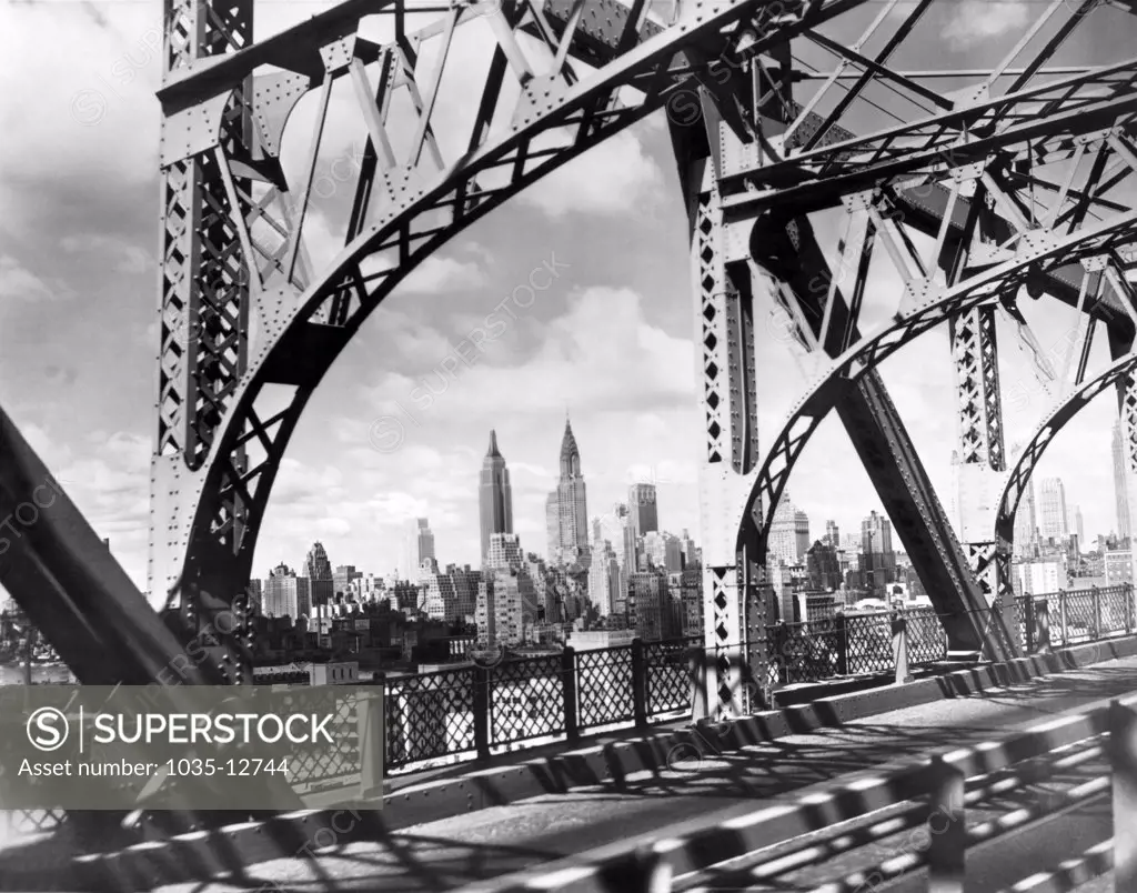 New York, New York:    c. 1937 The Midtown skyline as seen through the Queensboro Bridge