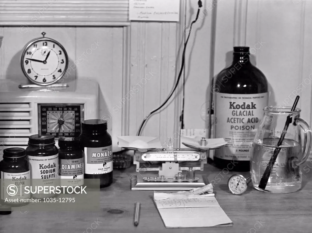 United States:   c. 1939 Kodak chemicals and other ingredients for developing film in a darkroom.