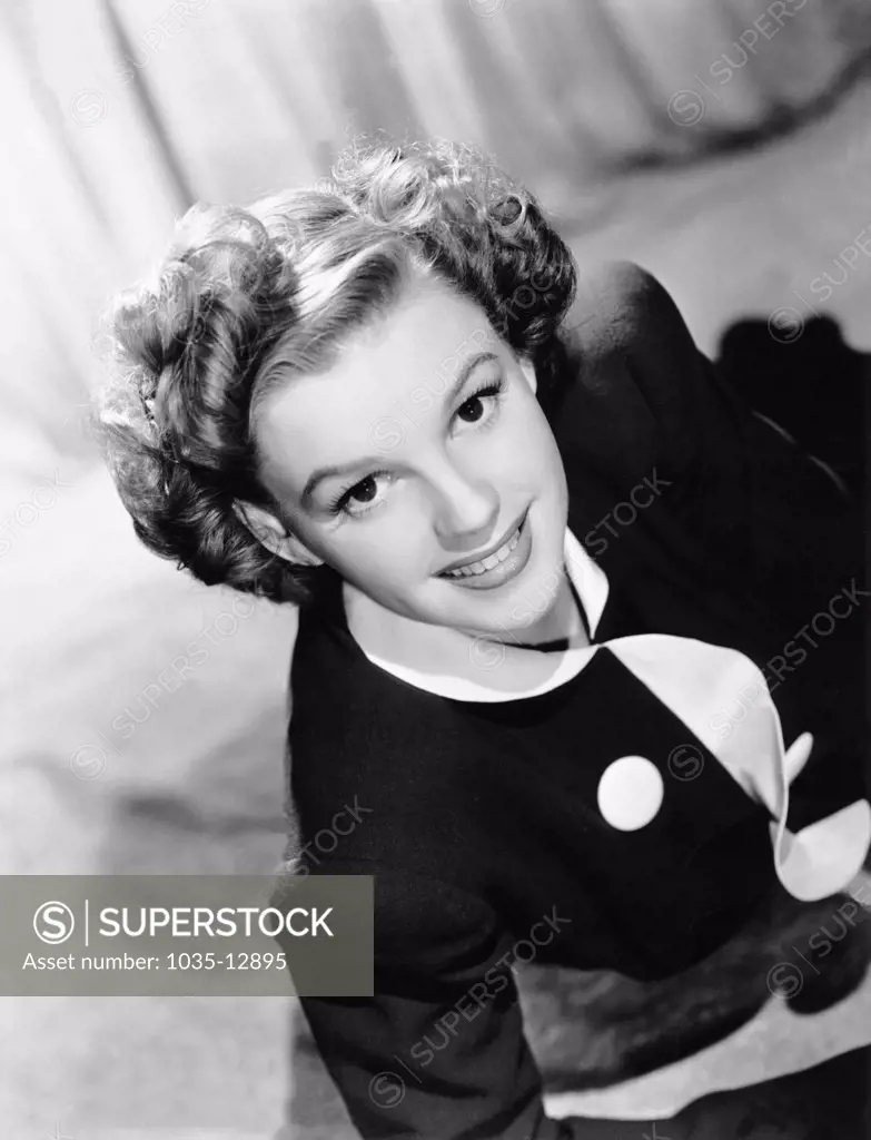 Hollywood, California:  c. 1940 An MGM studio portrait of actress Judy Garland.