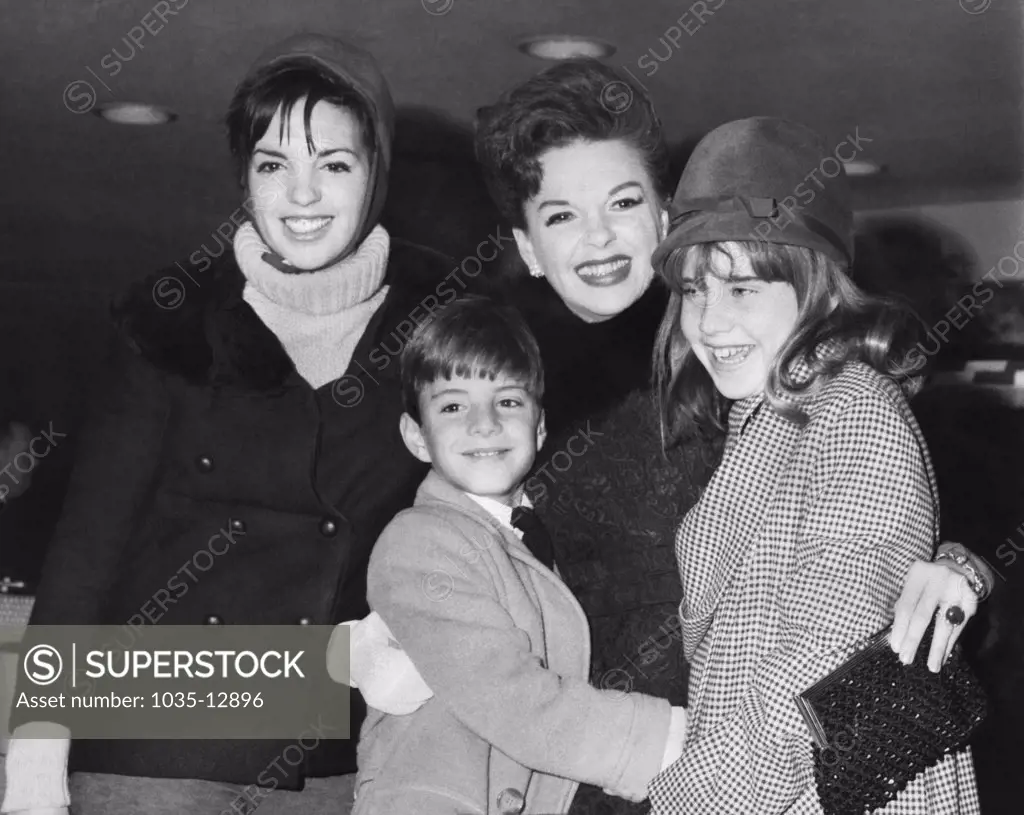 New York, New York: 1964 Judy Garland with all three of her children at JFK Airport. Left is Lisa Minnelli, and Joey and Lorna Luft.