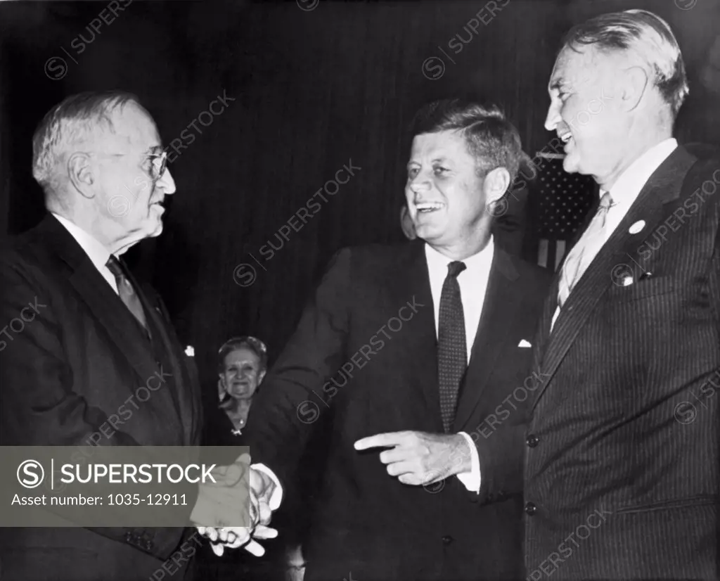 St. Louis, MIssouri:  October 3, 1960 Former President Harry S. Truman greets Senator John F. Kennedy as the Democratic candidate for President arrives for a speaking engagement. Senator Stuart Symington is at right.