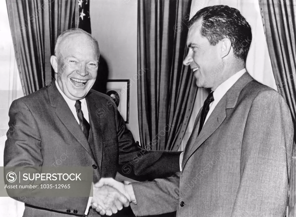 Washington, D.C.:  October 3, 1960 President Dwight D. Eisenhower shakes hands with Vice President Richard Nixon after a conference at the White house. Nixon is about to go out for his fourth week of campaigning as the Republican Presidential nominee.