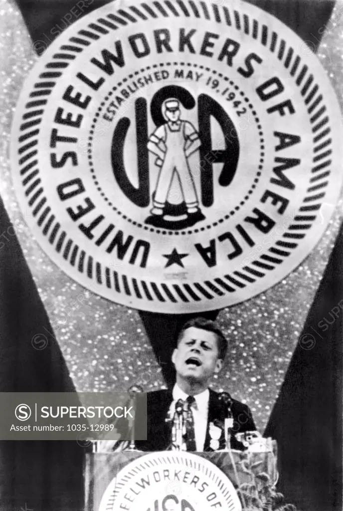 Atlantic City, New Jersey:  September 19, 1960 Senator John F. Kennedy speaking at the United Steelworkers told them he favors an increase in productivity  to produce full employment, rather than the 32 hour work week suggested by USW president David McDonald.