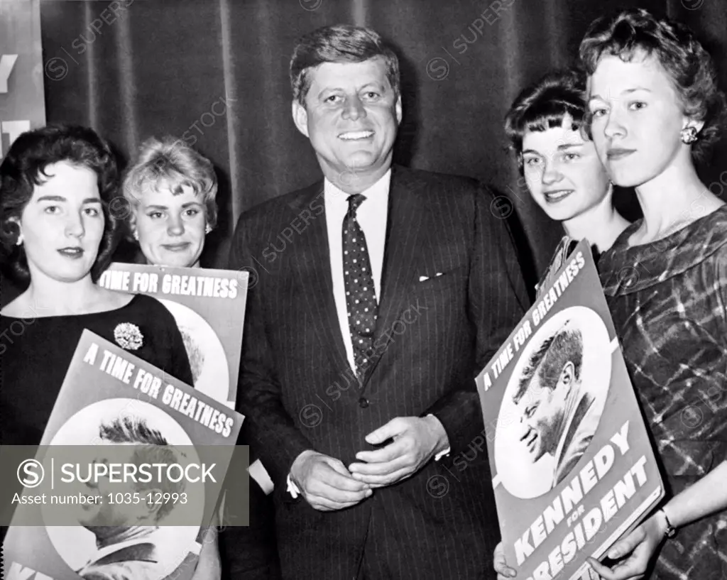 Racine, Wisconsin:  March 21, 1960 A group of young Democrats hold Kennedy posters as they greet Senator John F. Kennedy at the Racine convention.