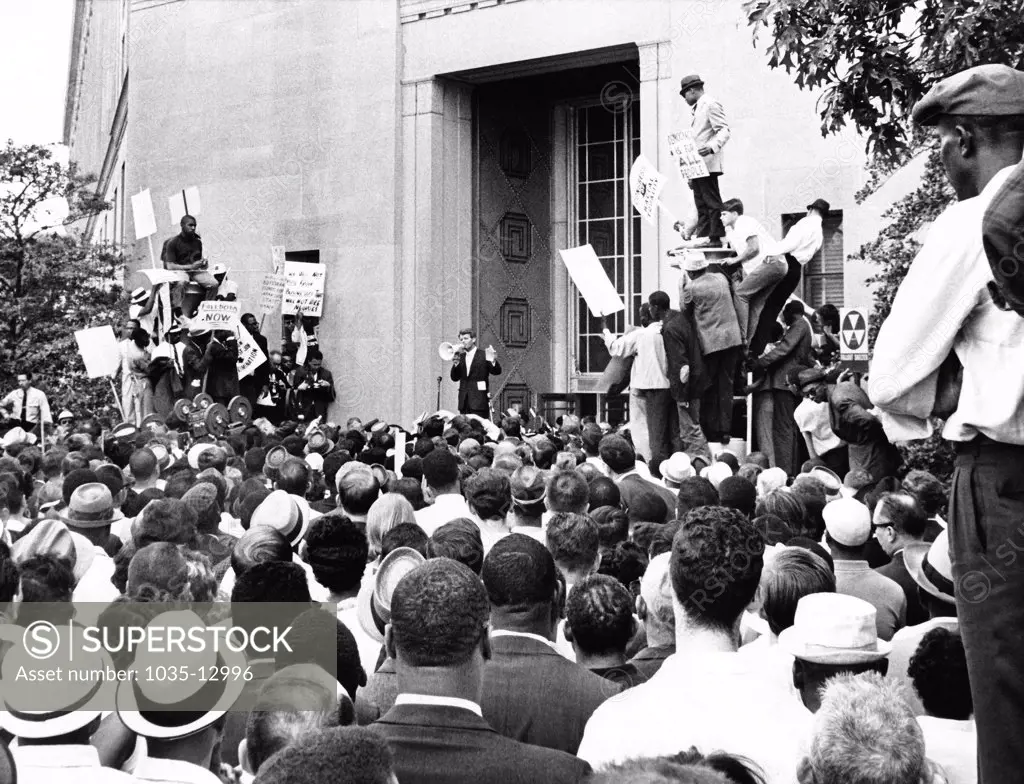 Washington, D.C.:  June 14, 1963 Attorney General Robert Kennedy addresses civil rights demonstrators in front of the Justice Deaprtment today.