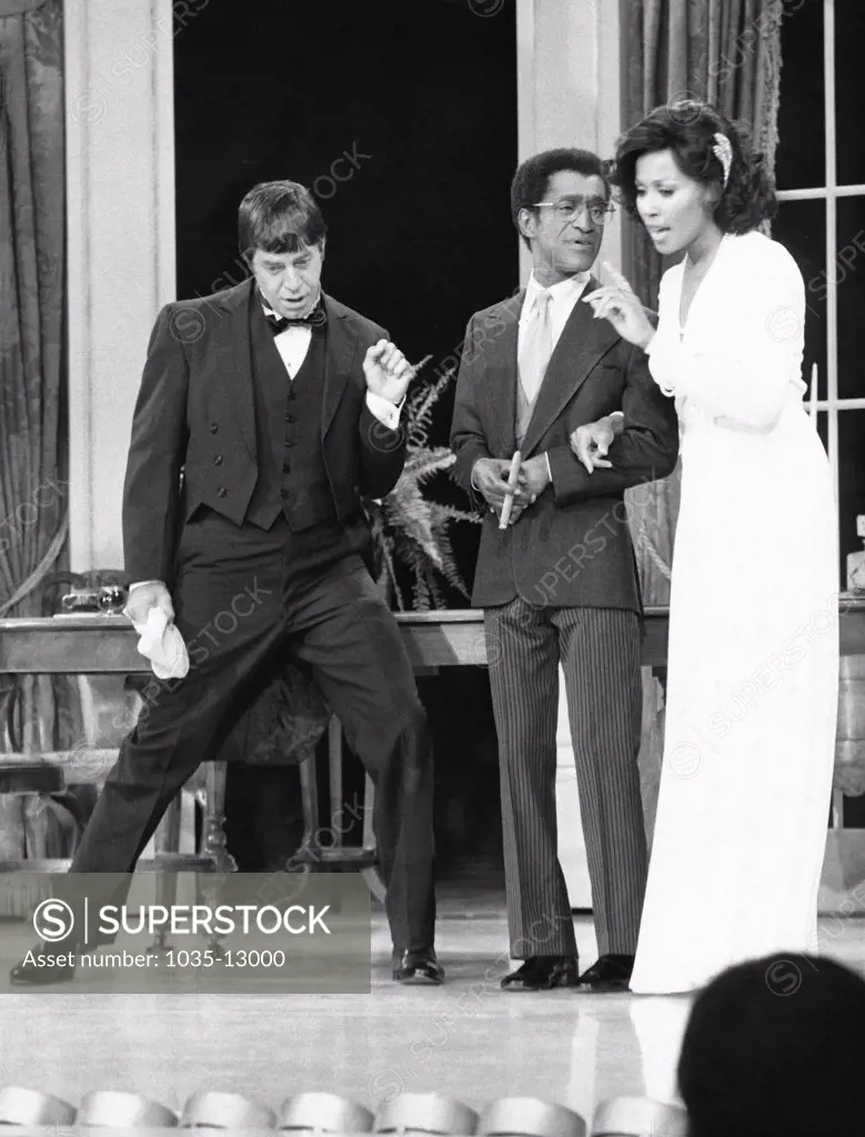 Hollywood, California:  September 13, 1973 Actors and entertainers Jerry Lewis, Sammy Davis Jr. and Diahann Carroll  in a scene from the premier of the new TV show, 'NBC Follies'.