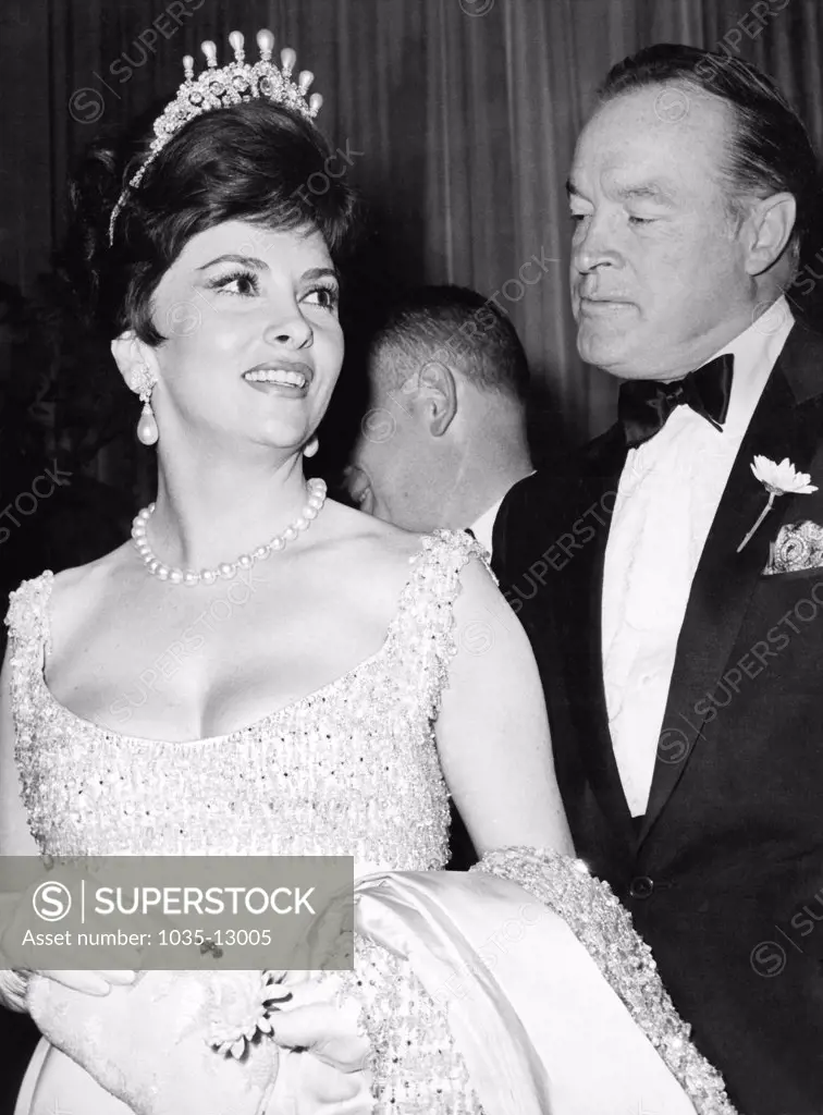 New York, New York:  May 6, 1963 Bob Hope and Gina Lollobrigida at Time Magazine's 40th anniversary dinner at the Waldorf Astoria. The dinner honored some 300 eminent men and women whose portraits have appeared on the news magazine's cover.