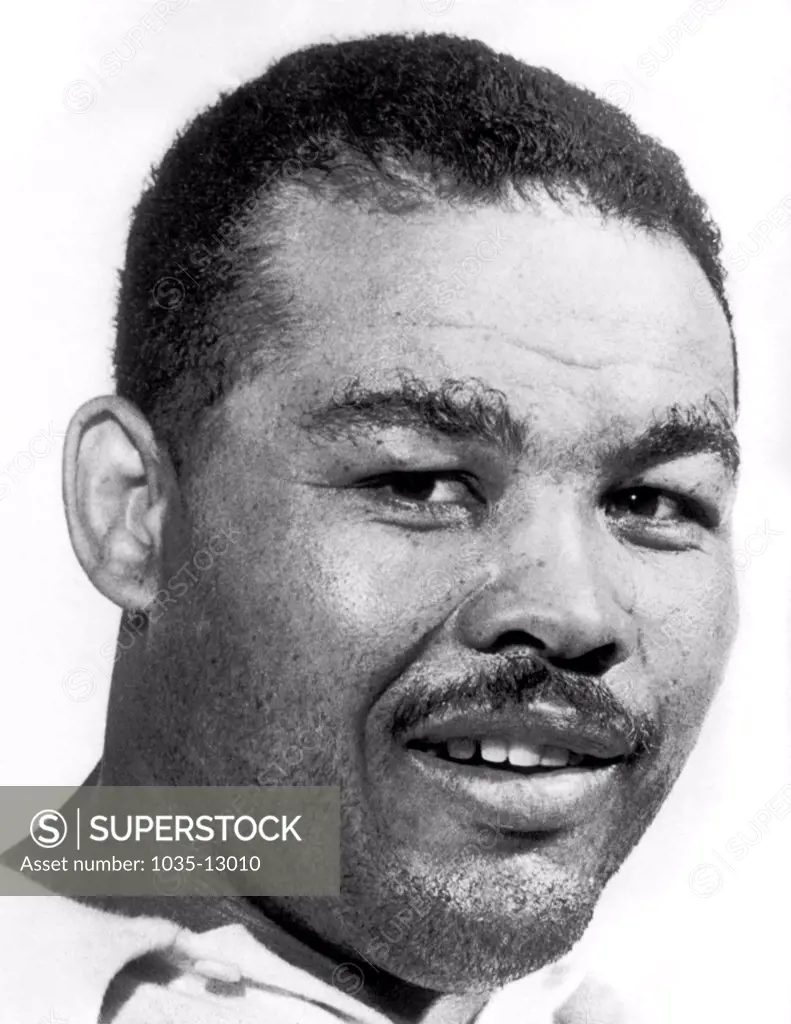 West Baden, Indiana:  August 4, 1950 Joe Louis who retired as the undefeated heavyweight boxing champion of the world has started training in an attempt to regain his title.