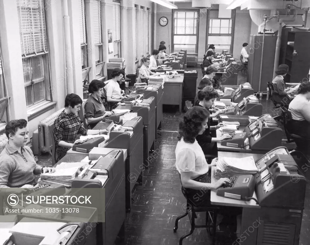 Cleveland, Ohio:  January 22, 1958 Women office workers entering data using tabulating machines and punch cards at the Erie Railroad Company offices.