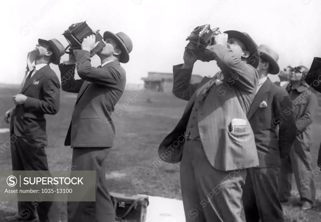 Berlin, Germany:  c. 1932 Photographers at an aviation event.
