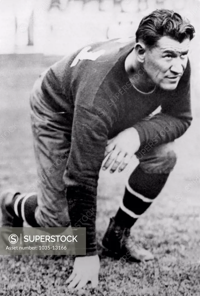 United States:  1925 Hall of Fame football player and all around athlete, JIm Thorpe. He was of Native American descent.