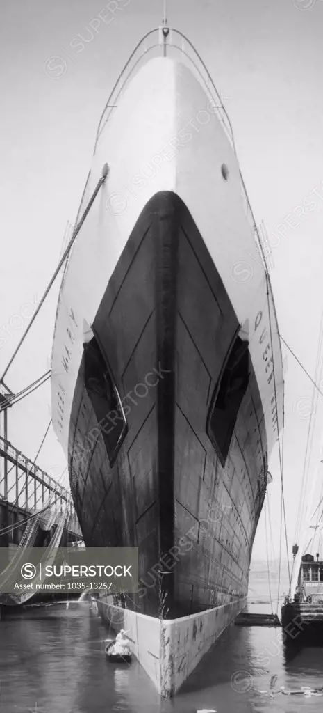 New York, New York:  June 2, 1936 A head-on view of the S.S. Queen Mary as she's docked in NY harbor after making her maiden voyage across the Atlantic Ocean.
