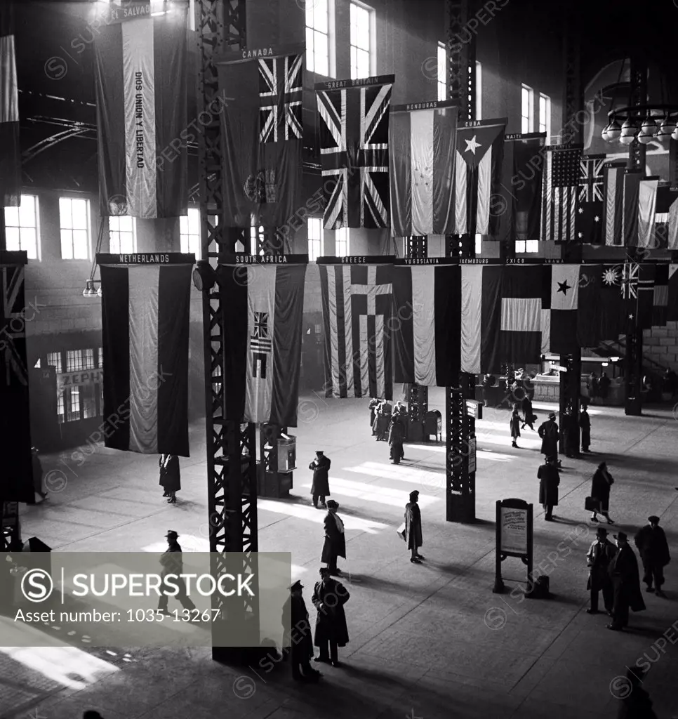 Chicago, Illinois:    January, 1943 The Union Station concourse with the flags of various countries hanging from the ceiling.